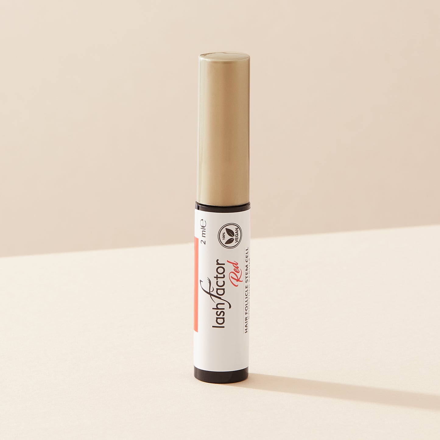 Red-serum-bottle-for-longer-and-fuller lashes-Lashfactor